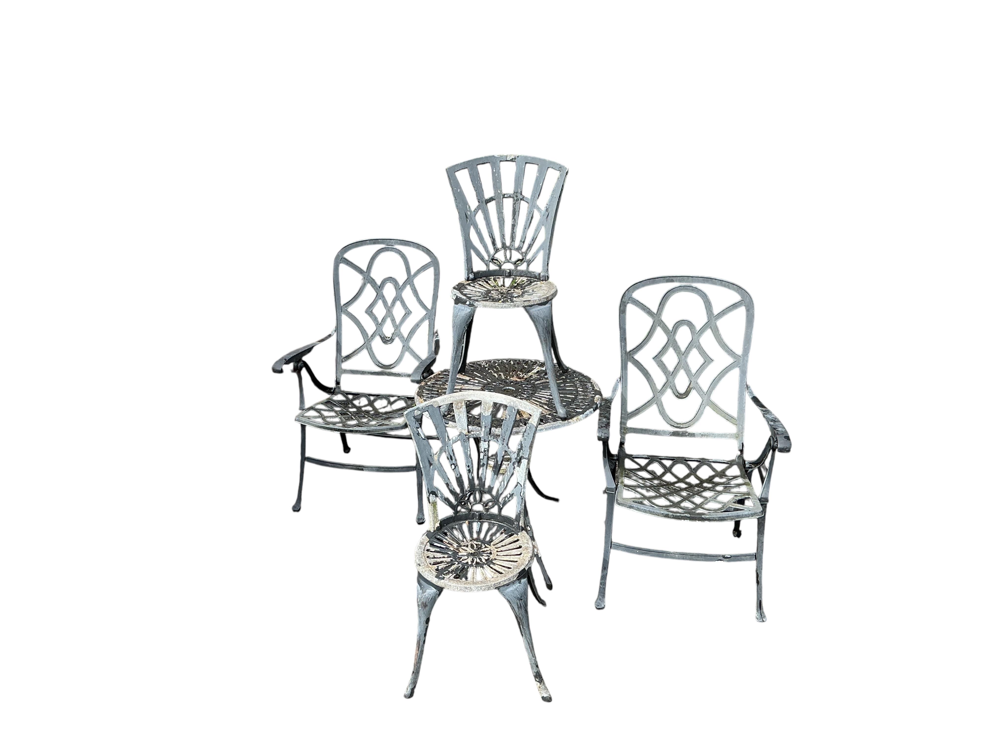 An aluminium garden bistro set and two metal folding garden chairs